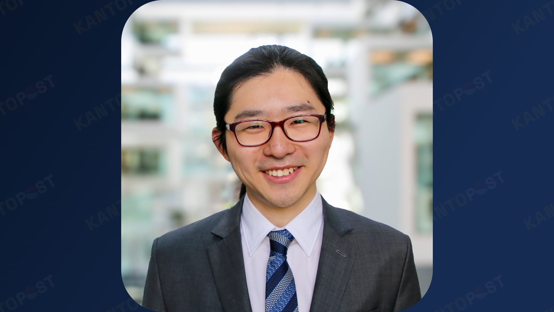 A photo of Dr. Leon Xiao in front of a blue Kanto Post background