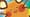 A close up of the artwork on the Dedenne GX Pokémon card from Unbroken Bonds