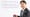 Shuntaro Furukawa holding a Nintendo Switch in front of the Nintendo logo